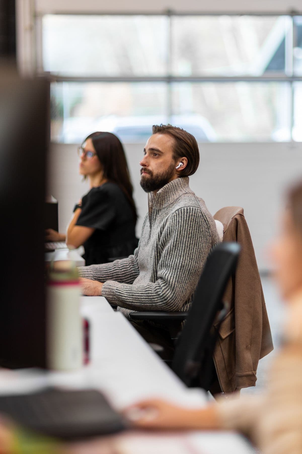 man looking at a computer